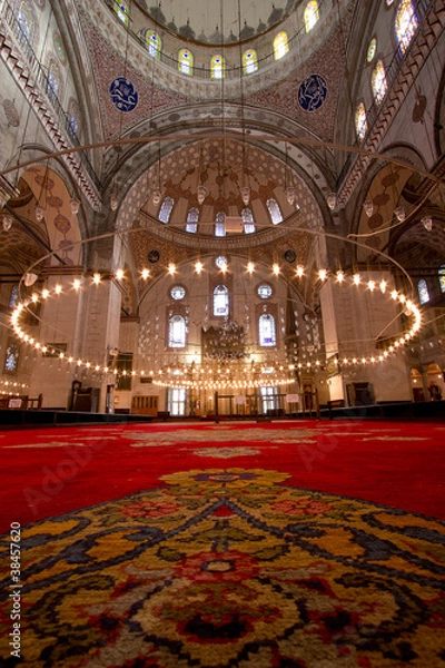 Obraz Inside Istanbul Mosque with red carpet in foreground