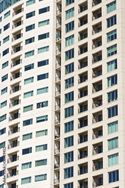 Fototapeta Wall of Condo Windows and Balconies