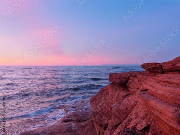 Fototapeta Colorful sunset at Cavendish beach on Prince Edward Island