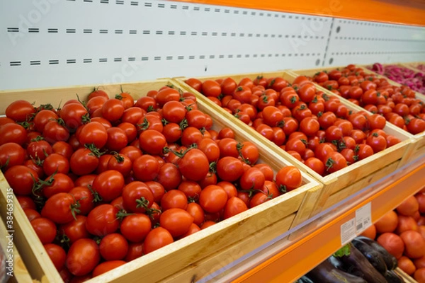 Obraz red tomatoes background. Group of tomatoes basket box