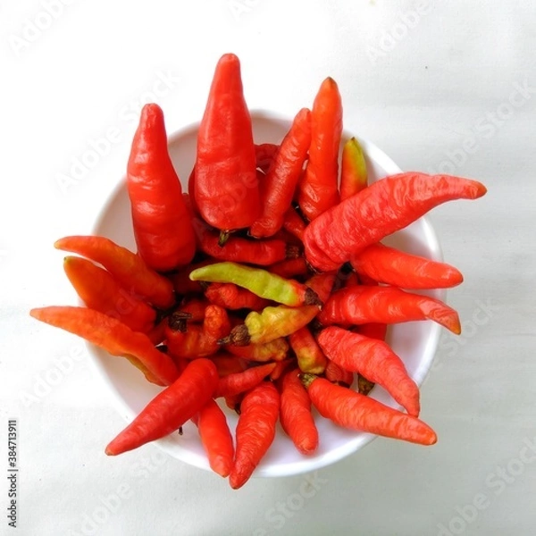 Obraz red  hot chili peppers isolated on white background