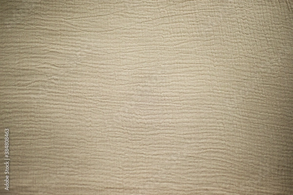 Fototapeta Fabric texture. Beige multi-layered muslin background for different designs. Textile theme.