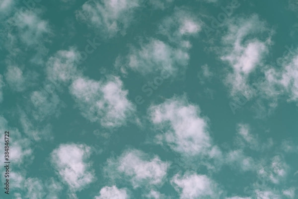 Fototapeta The sky is the color of sea waves and many small clouds