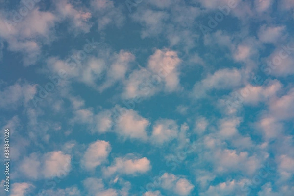 Obraz Beautiful small white clouds floating across the blue sky
