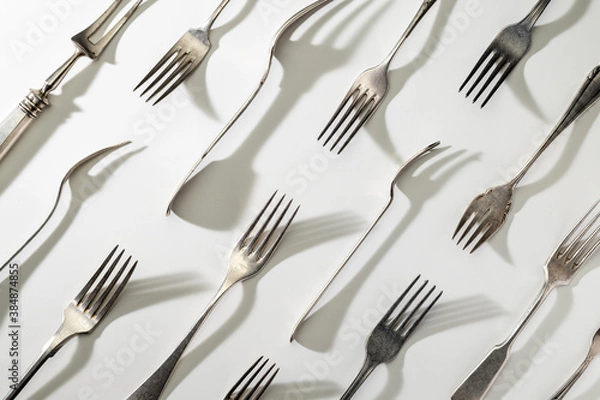 Fototapeta Vintage forks pattern, top view. Vintage cutlery