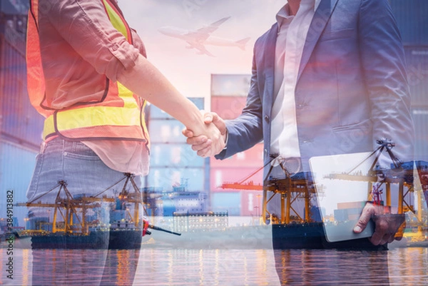 Fototapeta Double Exposure of Businessman and Container Shipping Worker Greeting Handshake Together With Containers Cargo Ship Port Terminal. Transportation Freight for Import/Export of Shipment Service Industry