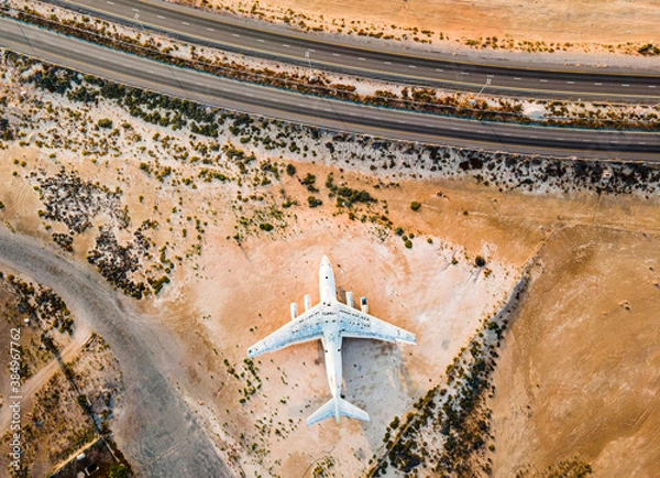 Fototapeta Deserted airplane in the in the Umm Al Quwain desert in the emirate of the United Arab Emirates