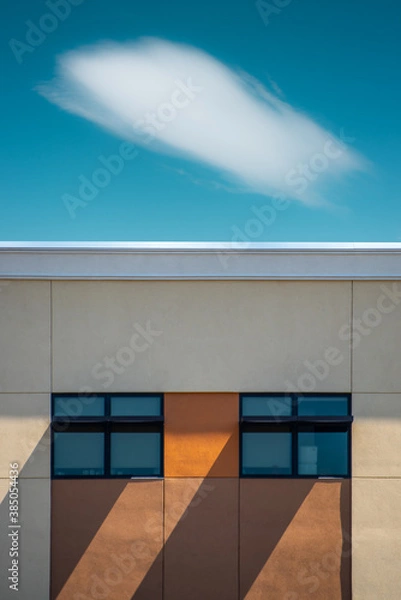 Fototapeta Minimalistic Photo of A Building, Windows and Cloud