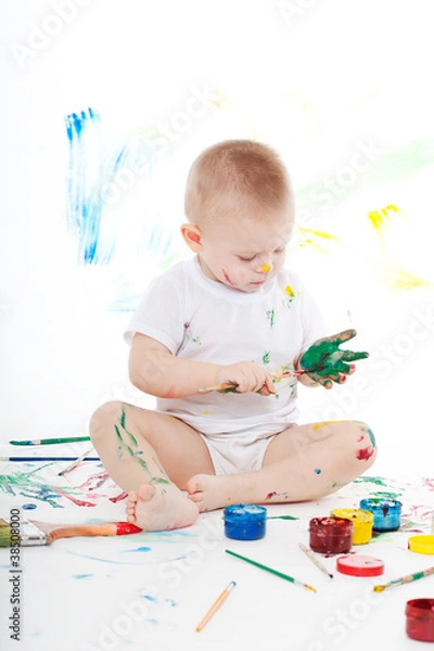 Fototapeta boy bedaubed with bright colors