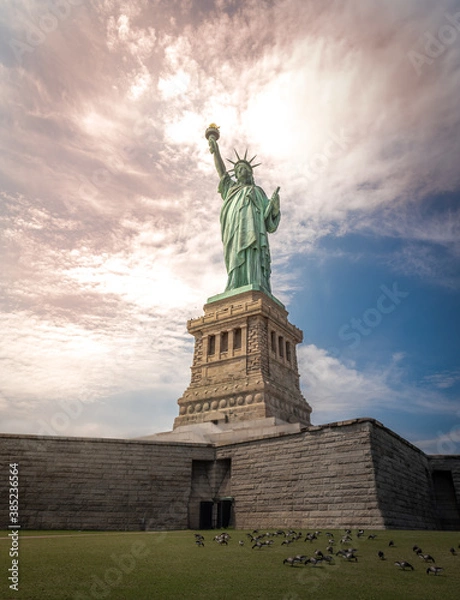 Obraz Shot of the Statue of Liberty in New York City, Usa. The shot is taken during a beautiful sunny day with a blue sky and white clouds in the background