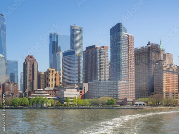 Obraz Shot of the skyline of New York City from the Hudson river, with skyscrapers of the downtown district and Wall Street