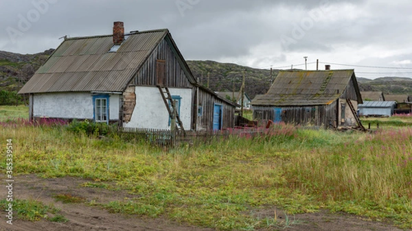 Obraz Houses in the village of Teriberka on the Barents sea coast, Russia, August 2020