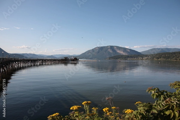 Obraz View of Shuswap lake with wooden wharf at Salmon Arm, British Columbia, Canada