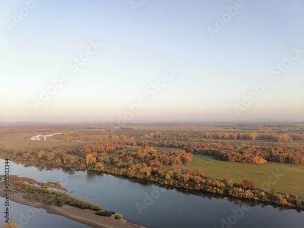 Fototapeta The view from the mountains to the White river in the fall