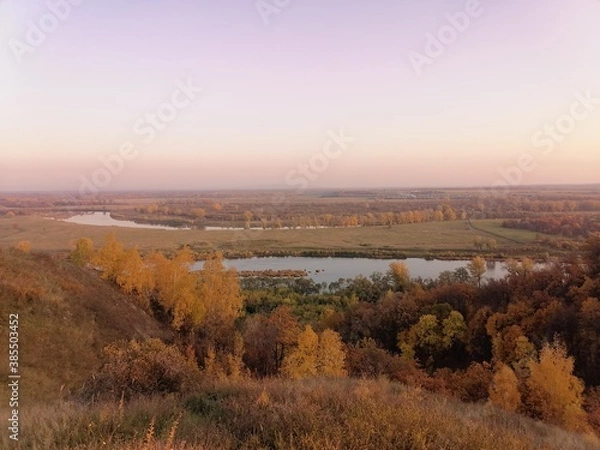 Fototapeta The view from the mountains to the White river in the fall