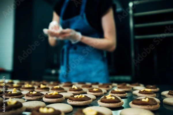Fototapeta pastru chef making macarons with peanut inside