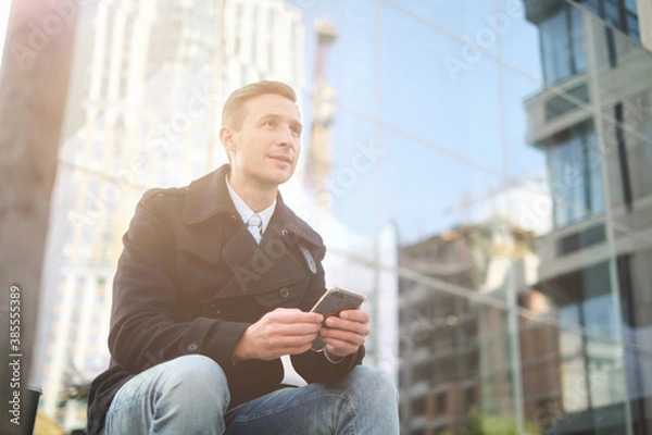 Fototapeta Handsome busyness man coffee time at sunny day in office district