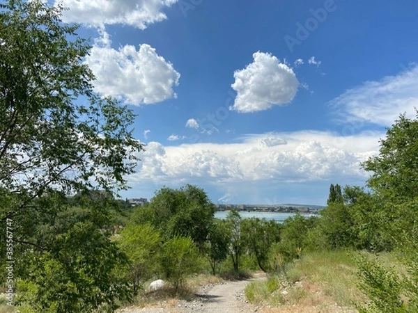 Fototapeta river and clouds