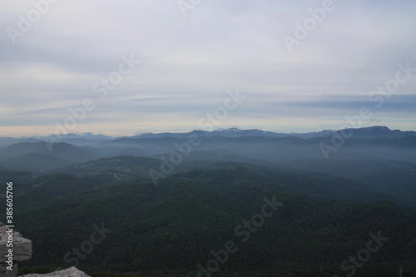 Fototapeta clouds over the mountains