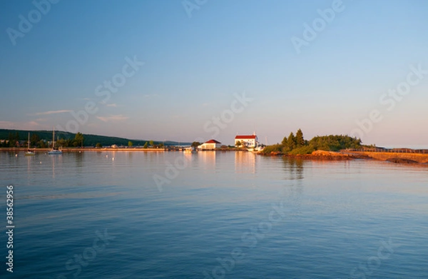 Fototapeta Calm waters on a coastal port