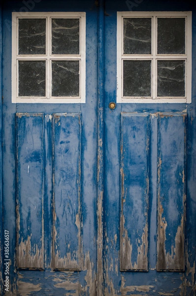 Obraz Close up of old, blue, wooden door with windows