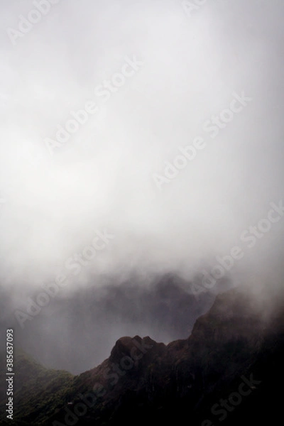 Fototapeta Foggy mountain that can represent danger.