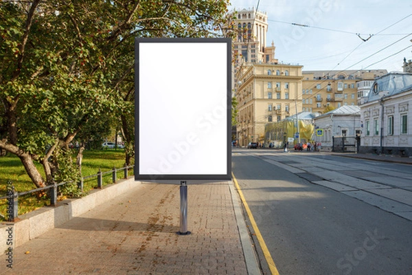 Fototapeta Advertising billboard stand mock up on the street.