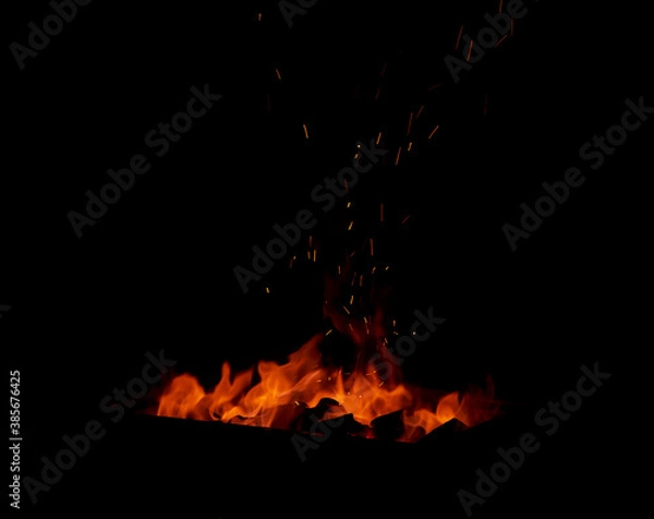 Fototapeta Fire on black background