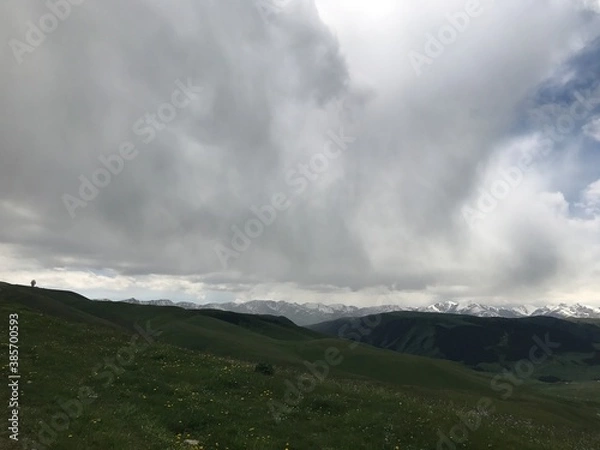 Fototapeta clouds over the mountains