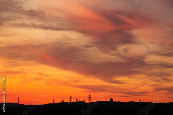 Fototapeta sunset over the city