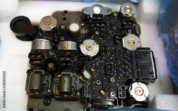 Fototapeta The valve block (control unit) of an automatic transmission of a modern car.