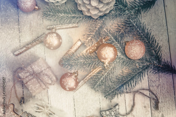Obraz Christmas background with toys, balls, cinnamon, sprigs of Christmas tree and sled. Place for text
