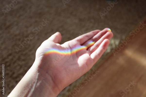 Obraz hand and rainbow in the room