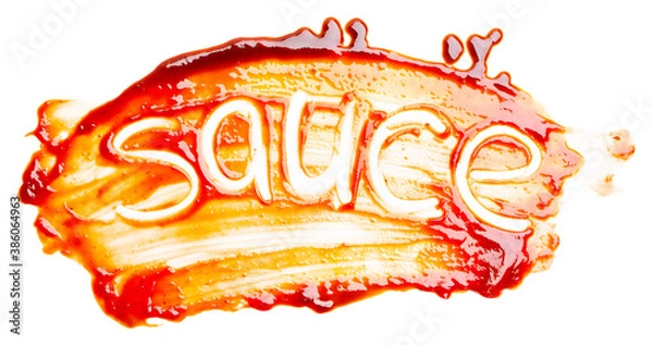Obraz The word SAUCE written with finger on the spilled sauce isolated on white background. Top view, close up.