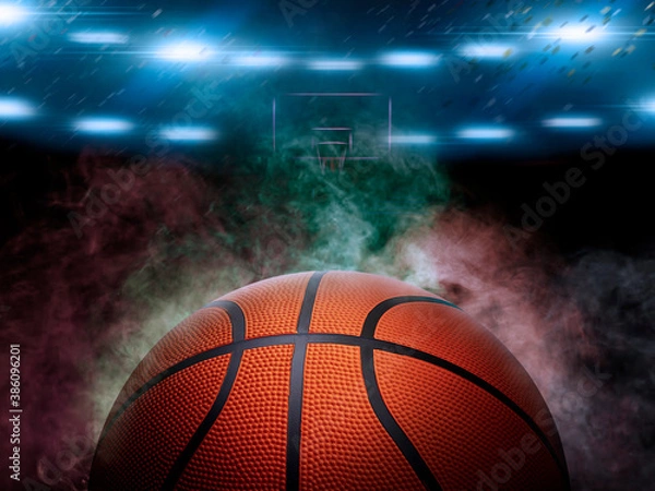 Fototapeta basketball on the color smoke background