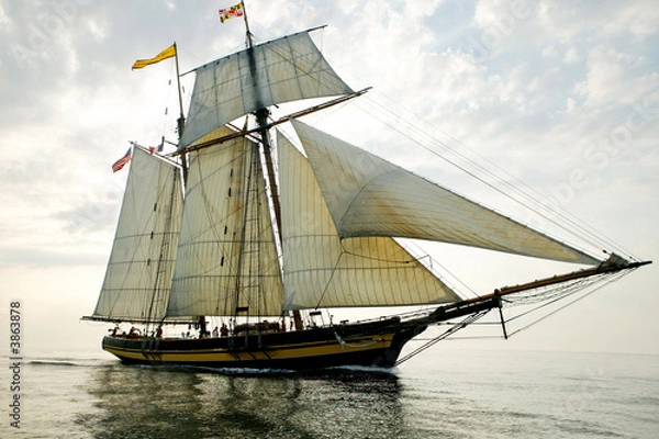 Obraz Amerykańska żaglówka na zachód słońca