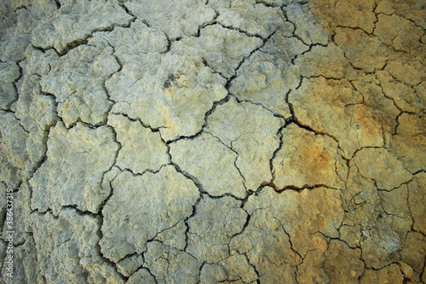 Fototapeta clay surface of the earth made of dry red refractory clay