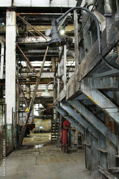 Obraz iron objects located on the territory of a plant for the production of iron steel and cast iron at a metal foundry or metal rolling plant