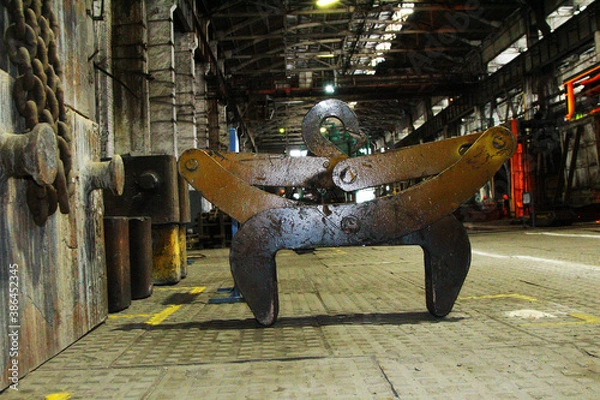 Obraz iron objects located on the territory of a plant for the production of iron steel and cast iron at a metal foundry or metal rolling plant