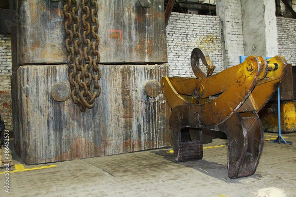 Obraz iron objects located on the territory of a plant for the production of iron steel and cast iron at a metal foundry or metal rolling plant