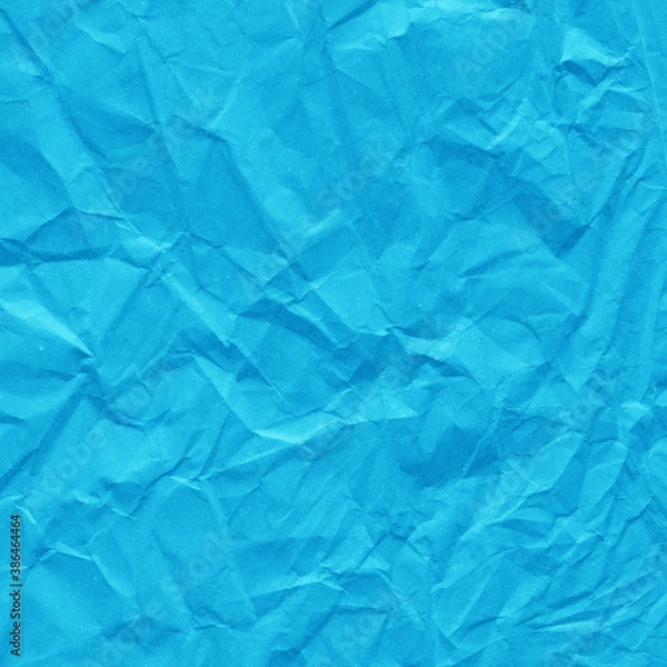 Fototapeta Blue vintage and old looking crumpled paper background. Retro cardboard texture. Grunge paper for drawing. Ancient book page. Present wrapping.