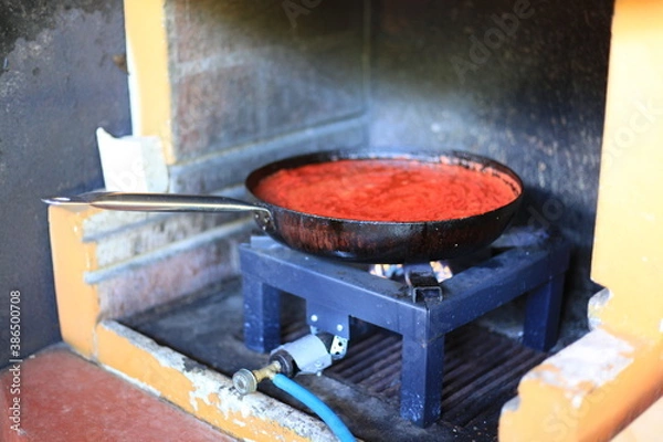 Fototapeta Salsa di pomodoro in tegame
