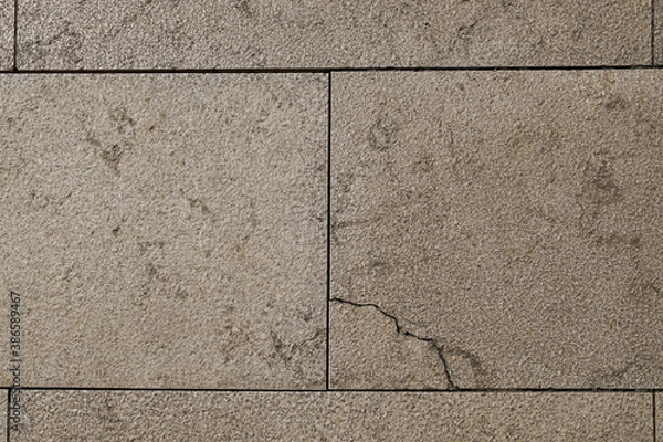 Fototapeta light brown and gray slabs with cracks