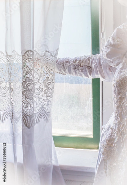 Obraz Bride looking out window