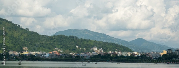 Fototapeta View of the Lakeside area in Pokhara city, Nepal, with the surrounding hills and Phewa Lake