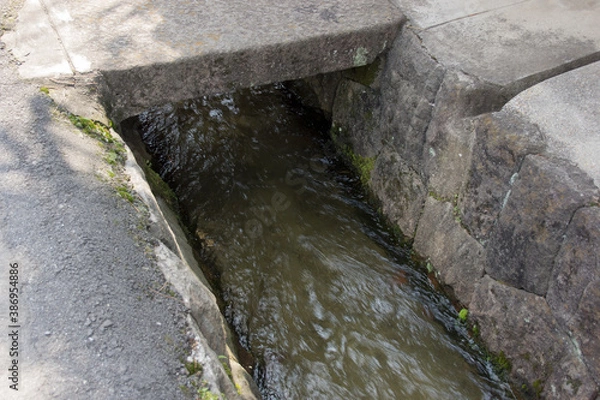 Fototapeta 住宅街の生活排水路