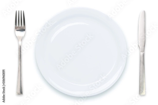 Fototapeta Cooking template - top view of an empty white plate with knife and fork isolated on a white background