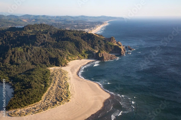 Fototapeta A view of the Oregon Coastal mountains and ocean toward the horizon as seen from the top of the Cascade Head Preserve
