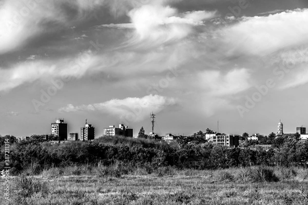 Obraz Ciudad y nubes