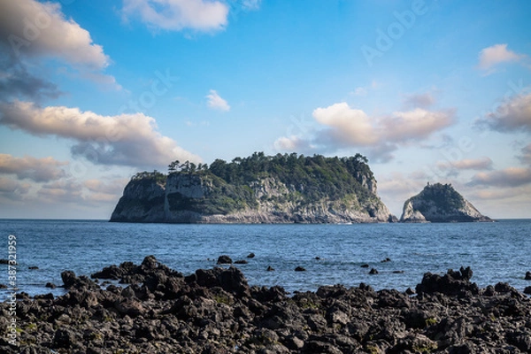Fototapeta Jeju Island is a representative tourist destination in Korea. This is Beomseom Island seen from Seogwipo Coastal Trail.	